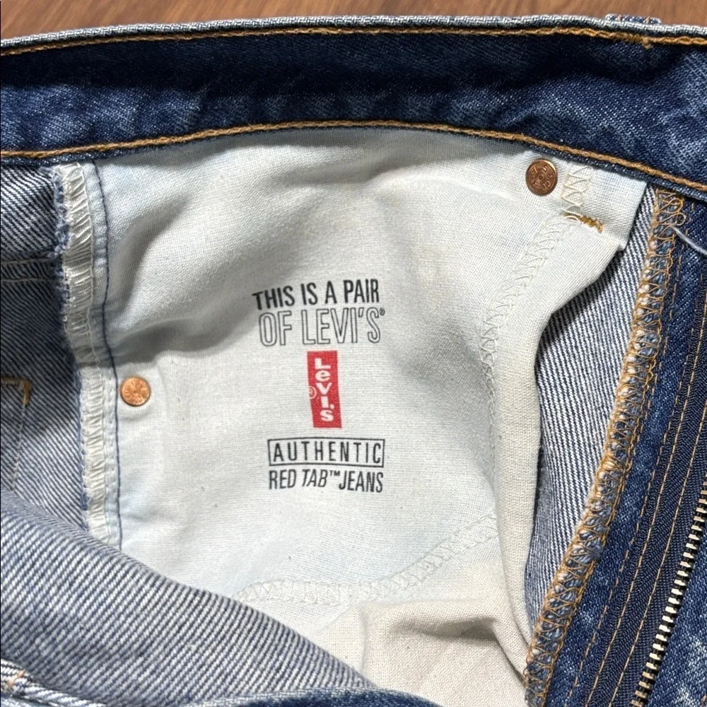 VTG Levi’s 517 Bootcut Jeans Made in USA 33x34 Red Tab Distressed Hem